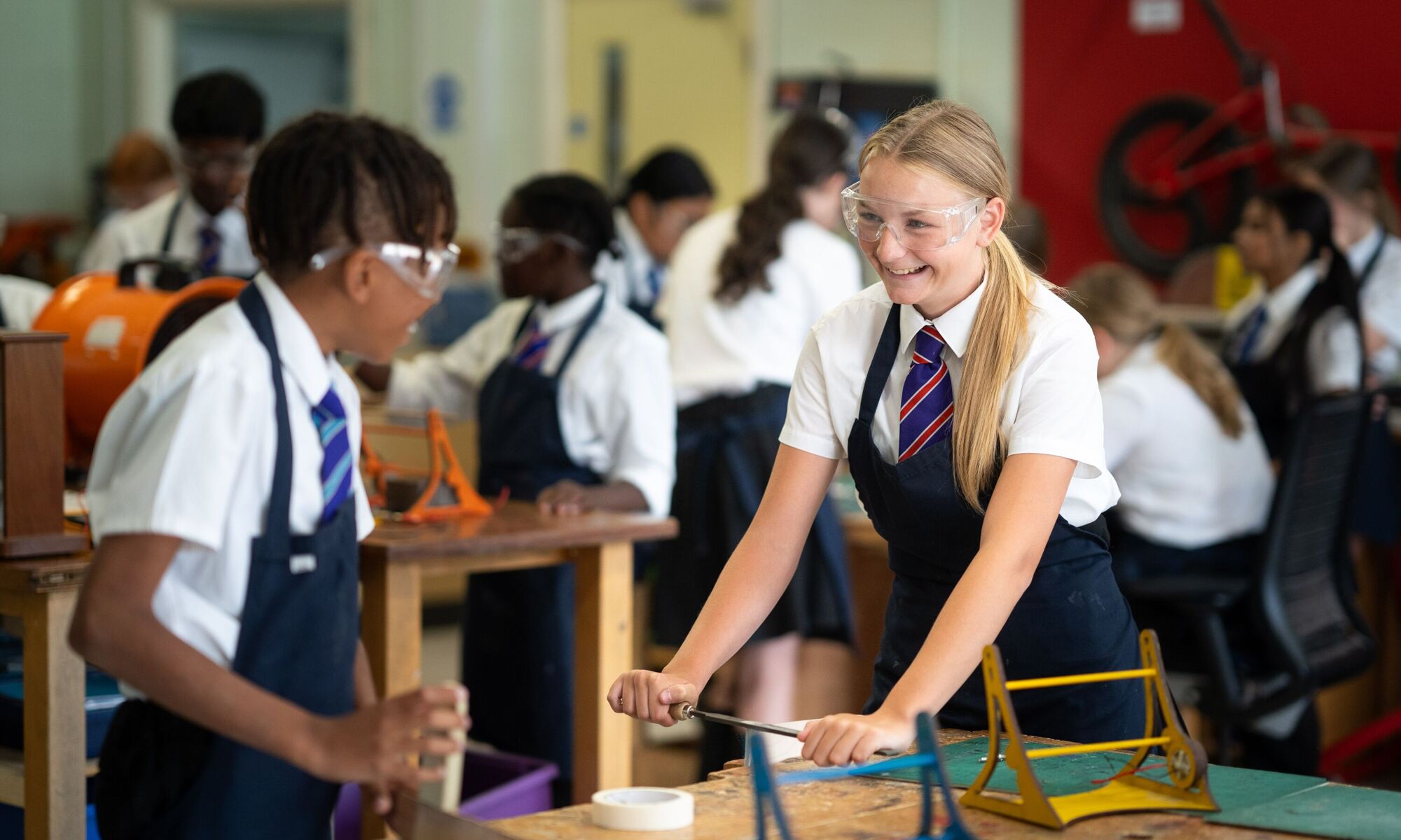 Male and female working in the Design Tech room