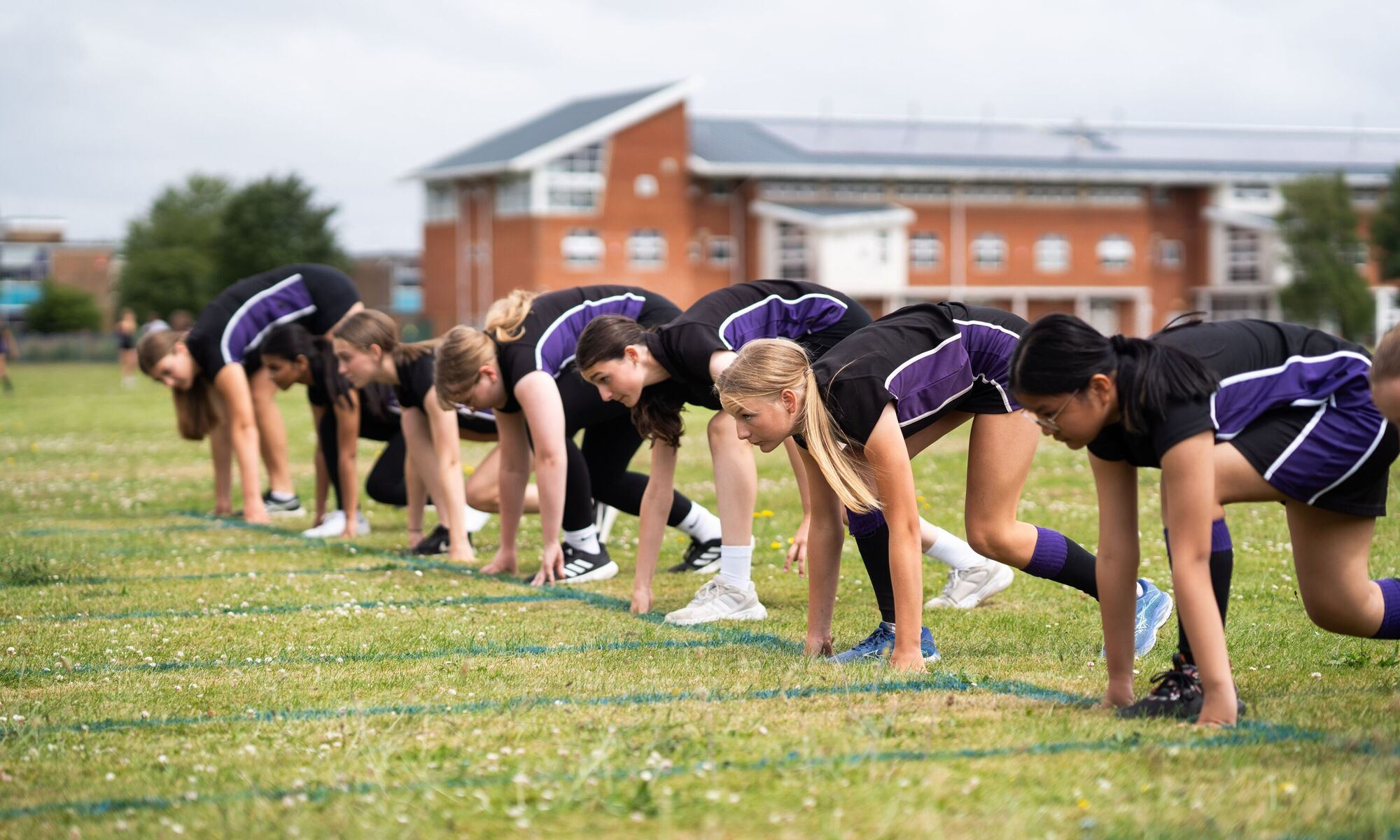 Getting ready to start a running race. Get set, get ready....Go!