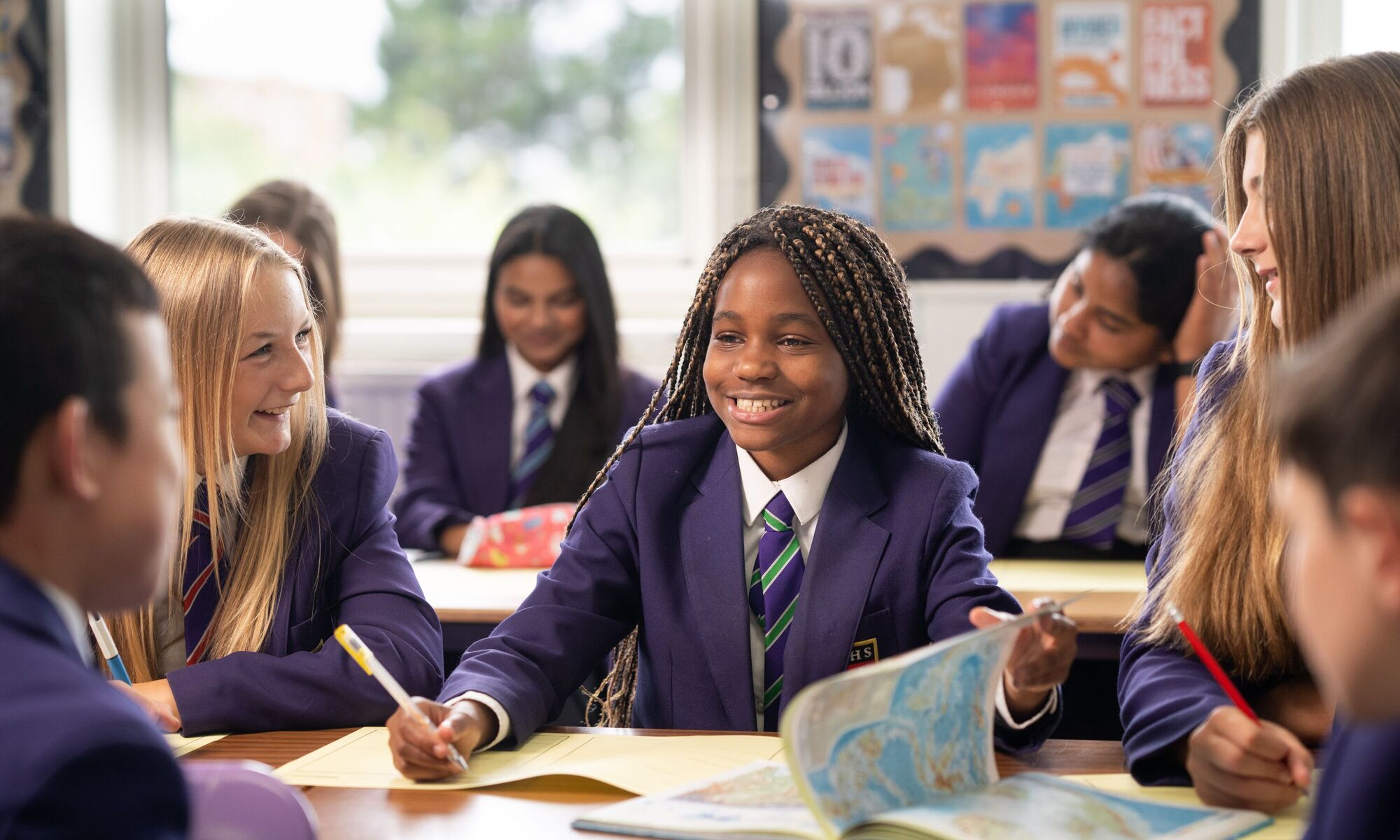 Mixed group of students in a Geography classroom
